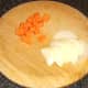 Carrot is diced and onion finely sliced.