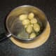 Potatoes are swirled in butter and mint