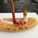 8. Place one pirate on each side of the boat.  Fill in the boat with additional deli meat slices.