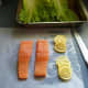 Just a few simple ingredients needed. Salmon fillets, romaine lettuce, fresh basil and a lemon...that's it!