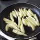 Fry the pears until golden