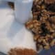 Walnuts, sugar and cinnamon in the food processor.