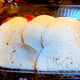 Add 4 tortillas to baking dish overlapping if necessary.