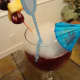 The Misty Stix clips easily onto the side of the glass.