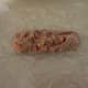 Spoon some mix onto your cling wrap, then form into a sausage-like shape.