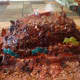 The smoking cake with lava pools.