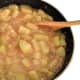 Mix the reserved 1/2 cup crumb mix into the zucchini mixture to thicken it.