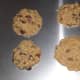 Cookies cooling on a cookie sheet.