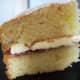 Sandwich the two layers together. .  Dust the top with icing (confectioner's) sugar.  Slice and serve.