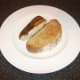 Ling fillet and artisan boule toast are plated