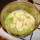 Potatoes are added to the softened onion and celery