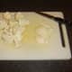 Cucumber and onion is prepared for casserole