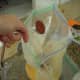 Add cocoa powder to butter and cheese mixture.