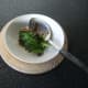 Remove porcini mushrooms and spinach from water with a slotted spoon