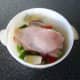 Lay stuffed chicken on bed of vegetables