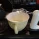 Once cool, slowly add chocolate mix to egg mix while continuously mixing.