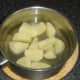Chopped potatoes ready for boiling