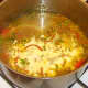 Coconut cream is added to curried fish soup