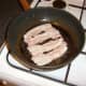 Bacon is fried in steak juices
