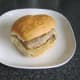 Assembled steak, mustard, mushroom and onion sandwich