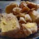 Optional; Slice and butter any stale rolls and place at bottom of dish.