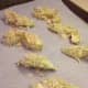 Places slices in a single layer on parchment-lined (sprayed with oil) baking sheet. Drizzle with olive oil or spray with cooking spray.