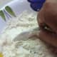 Dip the slices in the flour mixture so that they are completely covered. Shake off excess flour.  