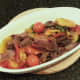 Kangaroo and roasted vegetables is added to serving plate