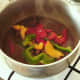 Bell pepper slices are added to kangaroo satay