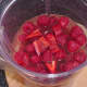 Raspberries, chilli, sugar syrup and lime juice ready for blitzing