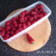 Fresh raspberries and red chilli pepper