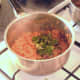 Chopped coriander is added to turmeric rice