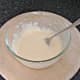 Batter is beaten with a fork