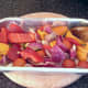 Oiling and seasoning vegetables for roasting