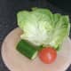 Lettuce leaves, cucumber and tomato for salad