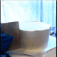 Spin the cake around a few times until your frosting is smooth enough to not pull any extra frosting off.