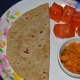 A chapati served with the curry.