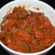Enjoy this tangy tomato and capsicum curry!