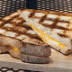 Smoke enhances a grilled cheese sandwich to a whole new level.