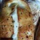 Fatayer jiban is a bread stuffed with cheese.