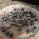 Blueberries dusted with flour.