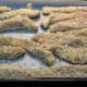 Line your chicken up on a baking tray with baking paper or put them on a plate to deep fry or pan fry.