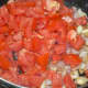 Step four: Add chopped tomatoes. Stir-cook over medium-high fire until they become mushy. Cover the pan for 2-3 minutes for fast cooking.