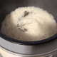 The fragrant coconut rice is cooked. Let the rice stays at warm setting in the rice cooker.