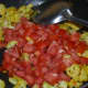 Step four: Add chopped tomatoes. Stir-cook till they become soft, not mushy.
