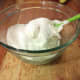 Once it gets close to an hour, get another large bowl. Fold in your french vanilla pudding mix with the whipped cream. Try not to stir. It will break down the whipped cream, and you really don't want that.