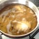 Cooled poached egg is briefly deep fried