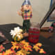 My little scarecrow watching over my ticket jar!