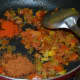 Add the red chili powder and pav bhaji masala powder. Sauté for 30 seconds.