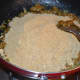 Step Six: Add roasted gram dal and sesame seeds powder. Nicely mix the contents with your fingers.
